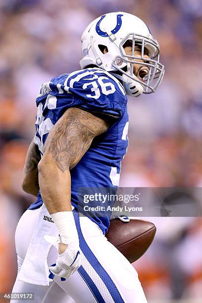 Daniel Herron of the Indianapolis Colts celebrates after scoring a touchdown against the Cincinnati Bengals during their AFC Wild Card game at Lucas...