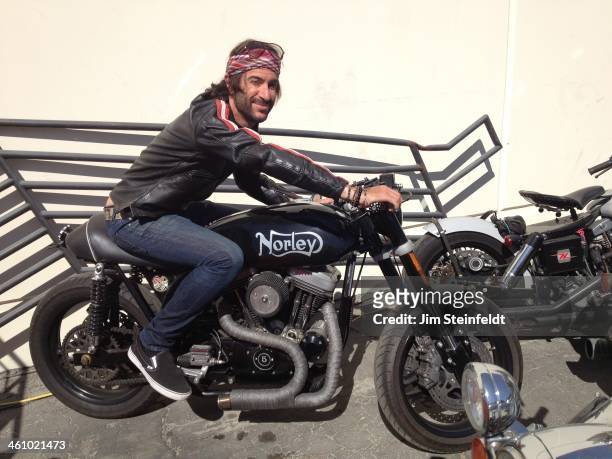 Rami Jaffee keyboardist for The Wallfowers and the Foo Fighters poses for a portrait on his Norley motorcycle at Fonogenic Studios in Van Nuys,...