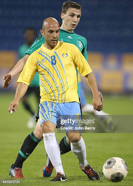 Mark Bresciano of Al Gharafa in action during the friendly match between Al Gharafa SC and Schalke 04 at the Al Gharafa Stadium on January 6, 2014 in...