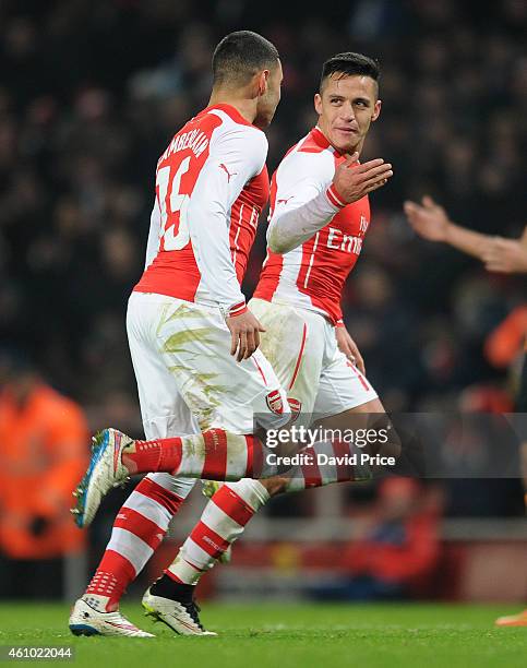 Alexis Sanchez celebrates scoring Arsenal's 2nd goal with Alex Oxlade-Chamberlain during the match between Arsenal and Hull City in the FA Cup 3rd...