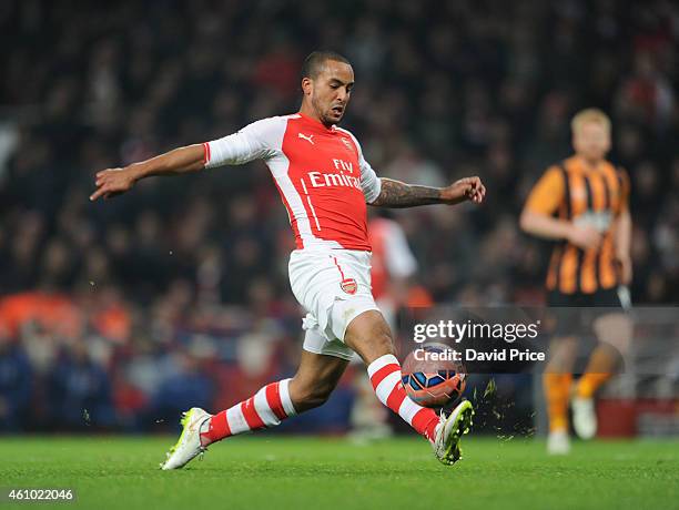 Theo Walcott of Arsenal during the match between Arsenal and Hull City in the FA Cup 3rd Round at Emirates Stadium on January 4, 2015 in London,...