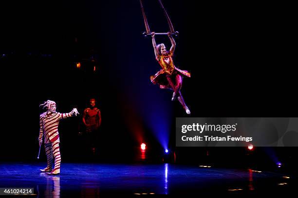 Yulia Korosteleva performs the solo trapeze act during the dress rehearsal for "Kooza" by Cirque Du Soleil" at Royal Albert Hall on January 4, 2015...