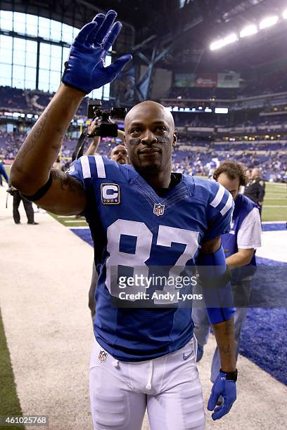 Reggie Wayne of the Indianapolis Colts leaves the field after the Colts win over the Cincinnati Bengals during their AFC Wild Card game at Lucas Oil...
