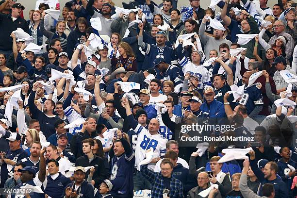 Dallas Cowboys fans cheer in the first half while taking on the Detroit Lions during the NFC Wildcard Playoff Game at AT&T Stadium on January 4, 2015...