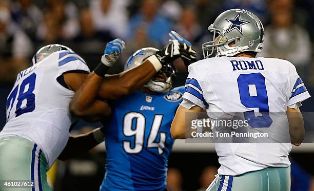 Ezekiel Ansah of the Detroit Lions rushes Tony Romo of the Dallas Cowboys as Jermey Parnell of the Dallas Cowboys blocks during the second half of...