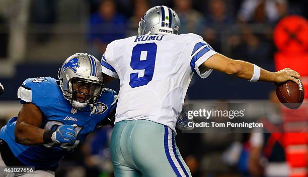 Ezekiel Ansah of the Detroit Lions closes in on Tony Romo during the second half of their NFC Wild Card Playoff game at AT&T Stadium on January 4,...