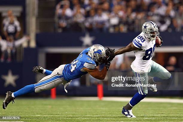 Dez Bryant of the Dallas Cowboys breaks away from DeAndre Levy of the Detroit Lions during the second half of their NFC Wild Card Playoff game at...