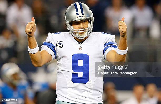Tony Romo of the Dallas Cowboys gestures against the Detroit Lions during the second half of their NFC Wild Card Playoff game at AT&T Stadium on...