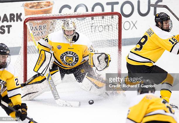 Chase Perry of the Colorado College Tigers watches the puck during NCAA hockey against the Providence College Friars at Schneider Arena on January 4,...