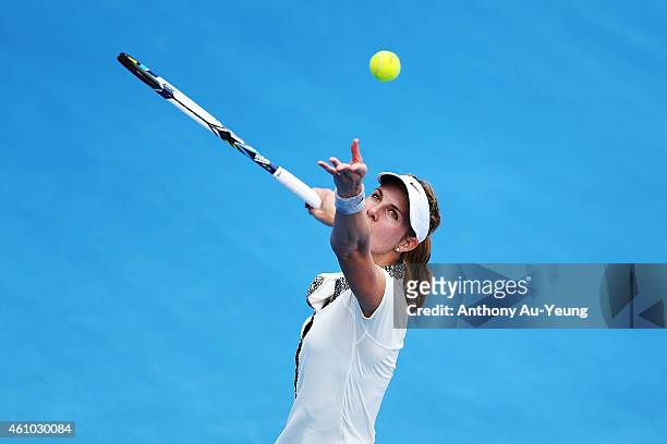 Mandy Minella of Luxembourg serves against Anna Tatishvili of USA during day one of the 2015 ASB Classic at ASB Tennis Centre on January 5, 2015 in...