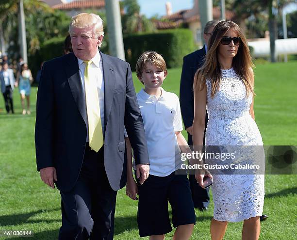 Donald Trump, Barron Trump and Melania Trump attends Trump Invitational Grand Prix Mar-a-Lago Club at The Mar-a-Largo Club on January 4, 2015 in Palm...