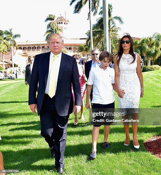 Donald Trump, Barron Trump and Melania Trump attends Trump Invitational Grand Prix Mar-a-Lago Club at The Mar-a-Largo Club on January 4, 2015 in Palm...