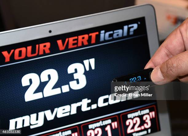 The Vert wearable jump device is displayed in front of a laptop displaying its information during a press event at the Mandalay Bay Convention Center...