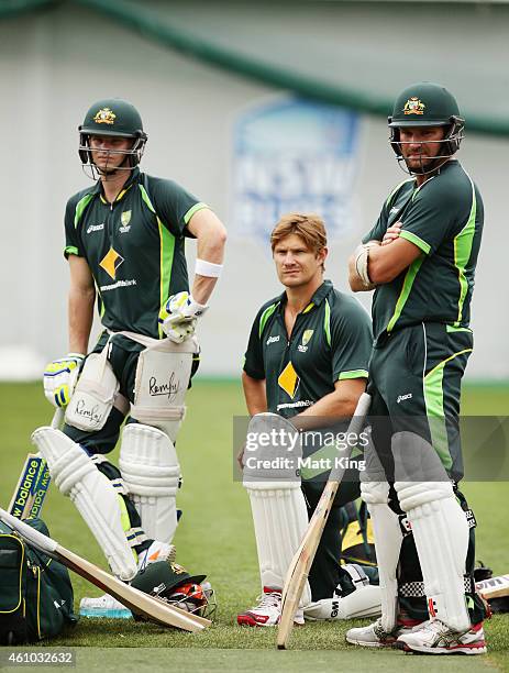 Steve Smith, Shane Watson and Ryan Harris wait to bat during an Australian nets session at Sydney Cricket Ground on January 5, 2015 in Sydney,...