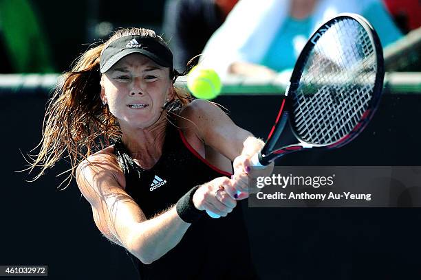 Daniela Hantuchova of Slovakia plays a backhand against Sara Errani of Italy during day one of the 2015 ASB Classic at ASB Tennis Centre on January...