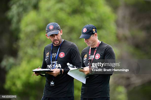Coach Tony Popovic and Ante Milicic of the Wanderers speak during a Western Sydney Wanderers A-League training session at Blacktown International...