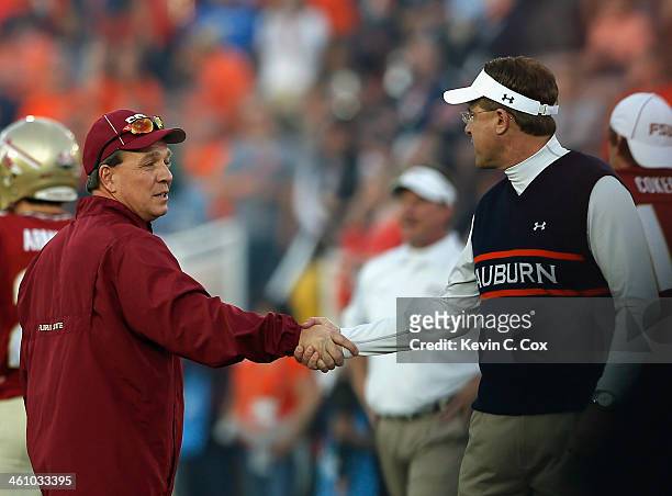 Florida State Seminoles head coach Jimbo Fisher and Auburn Tigers head coach Gus Malzahn shake hands prior to the 2014 Vizio BCS National...
