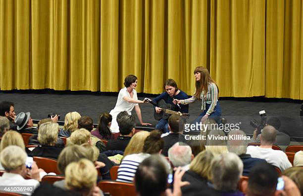 Actress Anne Hathaway and musicians Johnathan Rice and Jenny Lewis on stage after a screening of "Song One" at the 26th Annual Palm Springs...