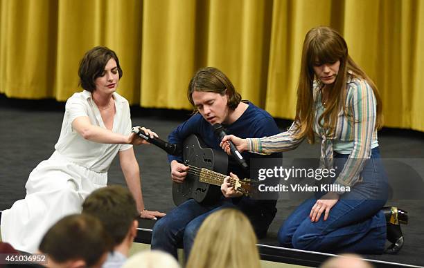 Actress Anne Hathaway and musicians Johnathan Rice and Jenny Lewis on stage after a screening of "Song One" at the 26th Annual Palm Springs...