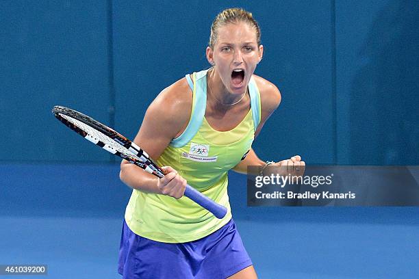 Karolina Pliskova of the Czech Republic celebrates victory after defeating Victoria Azarenka of Belarus during day two of the 2015 Brisbane...