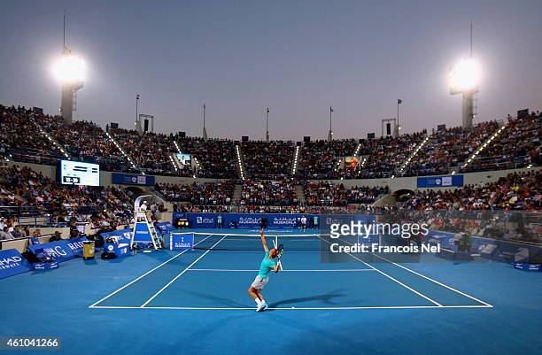 Rafael Nadal of Spain serves against Andy Murray of Great Britain during the semi final match of the Mubadala World Tennis Championship at Zayed...