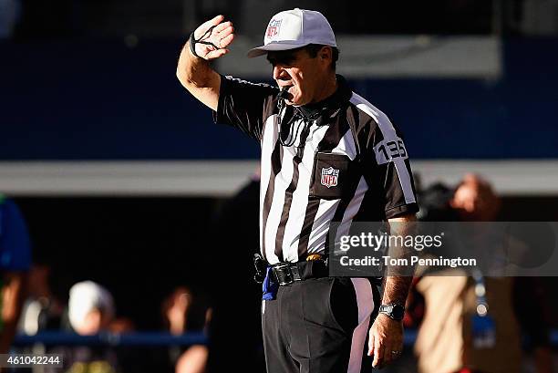 Referee Peter Morelli during a NFC Wild Card Playoff game against the Dallas Cowboys and the Detroit Lions at AT&T Stadium on January 4, 2015 in...