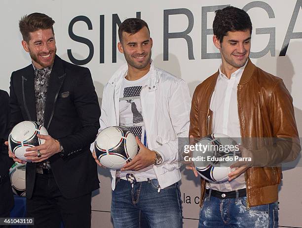 Soccer player Sergio Ramos, soccer player Jese Rodriguez and soccer player Isco attend 'Ningun Nino Sin Regalo' Campaign presentation at Estadio...