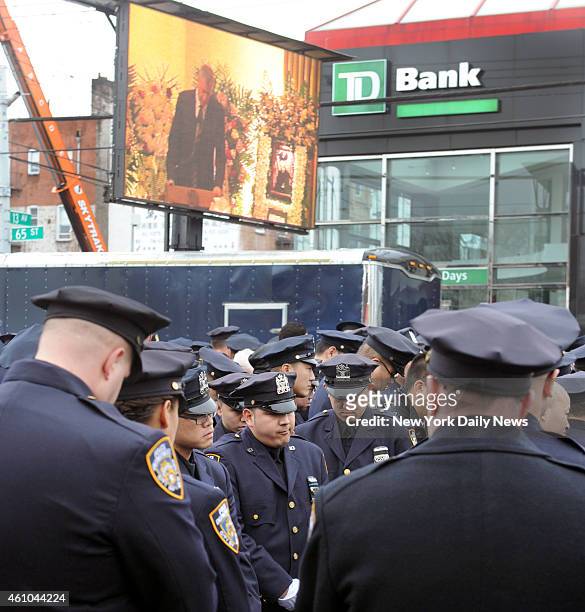 Police turn their backs to Mayor Bill de Blasio as he speaks at funeral of NYPD cop Wenjian Liu at Aievoli Funeral Home in Bensonhurst . Liu was...
