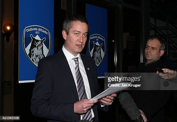Oldham Athletic Chief Executive Neil Joy reads out a statement on behalf of the club at Boundary Park on January 5, 2015 in Oldham, England.