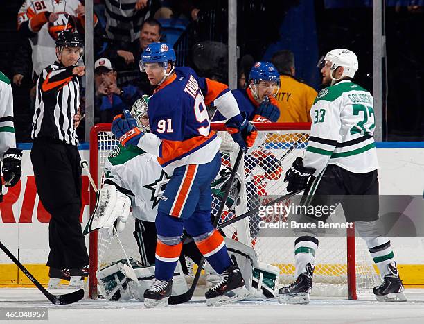 John Tavares of the New York Islanders celebrates his second goal of the game on the powerplay at 6:19 of the third period against the Dallas Stars...