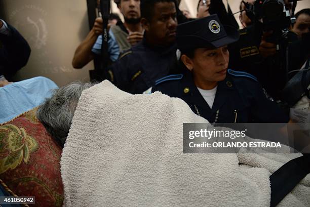 Former Guatemalan de facto president , retired General Jose Efrain Rios Montt, arrives on a stretcher as a retrial against him opens in Guatemala...