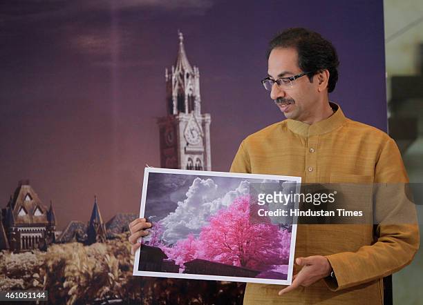 Shiv Sena President Uddhav Thackeray interacts with the media during a press conference held at Worli to announce his upcoming photo exhibition on...