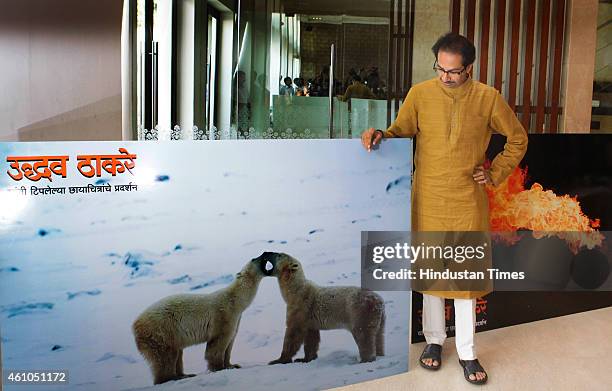 Shiv Sena President Uddhav Thackeray interacts with the media during a press conference held at Worli to announce his upcoming photo exhibition on...