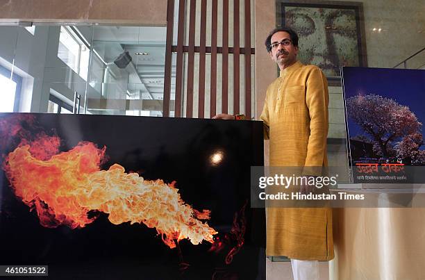 Shiv Sena President Uddhav Thackeray interacts with the media during a press conference held at Worli to announce his upcoming photo exhibition on...