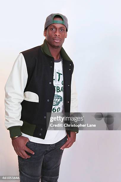Football player Geno Smith is photographed at the NFL Inaugural Hall of Fashion Launch Event on September 17, 2014 at Pillars 37 in New York City.