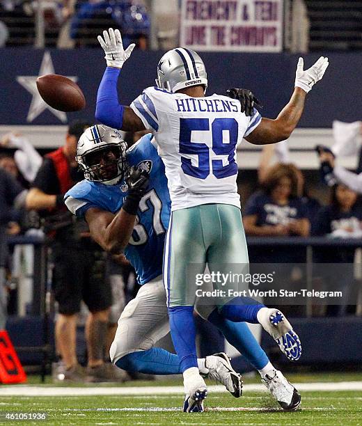 Dallas Cowboys outside linebacker Anthony Hitchens gets hit in the back by a pass to Detroit Lions tight end Brandon Pettigrew in the fourth quarter...