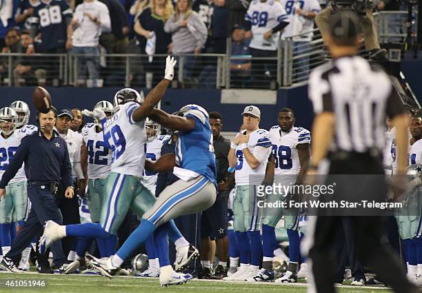 Dallas Cowboys outside linebacker Anthony Hitchens gets hit in the back by a pass to Detroit Lions tight end Brandon Pettigrew in the fourth quarter...