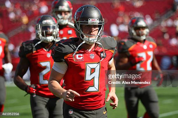 Michael Koenen of the Tampa Bay Buccaneers is seen as he runs onto the field during an NFL football game against the New Orleans Saints at Raymond...