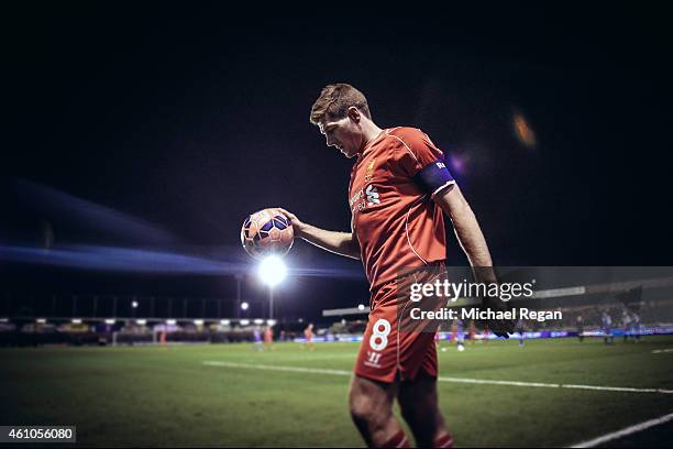 Steven Gerrard of Liverpool prepares to take a corner during the FA Cup Third Round match between AFC Wimbledon and Liverpool at The Cherry Red...