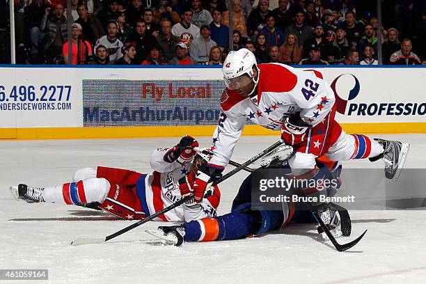 Joel Ward of the Washington Capitals skates against the New York Islanders during a game at the Nassau Veterans Memorial Coliseum on December 29,...