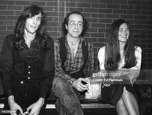 Quicksilver Messenger Service guitarist John Cipollina, Grateful Dead lyricist Robert Hunter and Grateful Dead singer Donna Godchaux pose backstage...