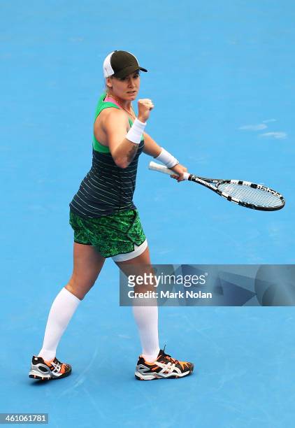 Bethanie Mattek-Sands of the USA celebrates winning her second round match against Agnieszka Radwanska of Poland during day three of the 2014 Sydney...