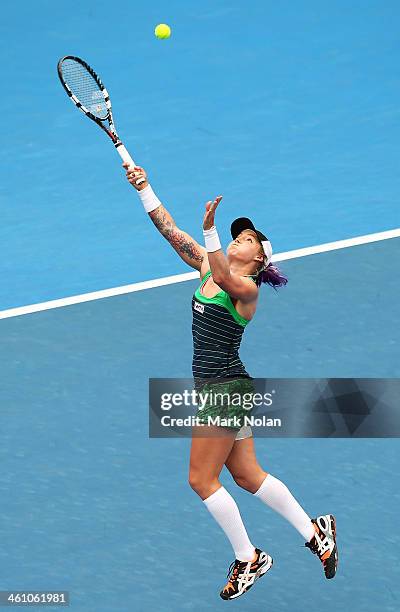 Bethanie Mattek-Sands of the USA plays an over head smash in her second round match against Agnieszka Radwanska of Poland during day three of the...