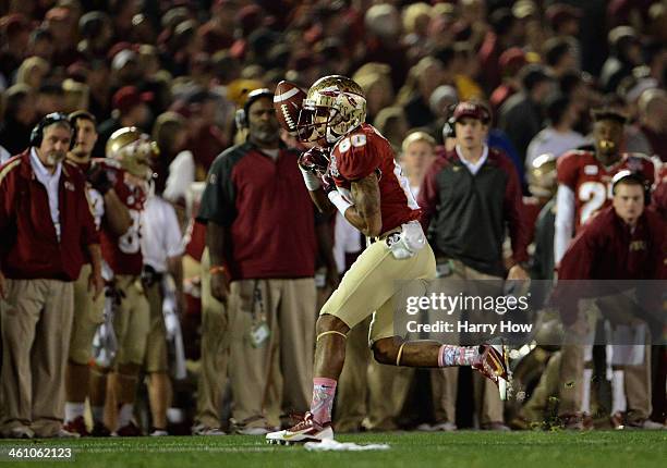 Wide receiver Rashad Greene of the Florida State Seminoles drops a pass in the second quarter of the 2014 Vizio BCS National Championship Game...