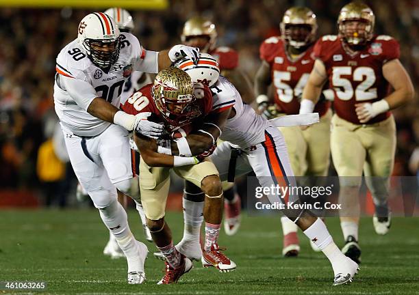 Wide receiver Rashad Greene of the Florida State Seminoles runs with the ball after a catch during the 2014 Vizio BCS National Championship Game...