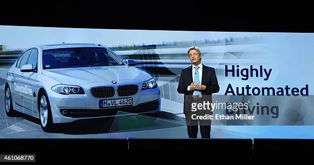 Group Senior Vice President Electrics/Electronics and Driver Environment Elmar Frickenstein speaks during a keynote address by President and CEO of...