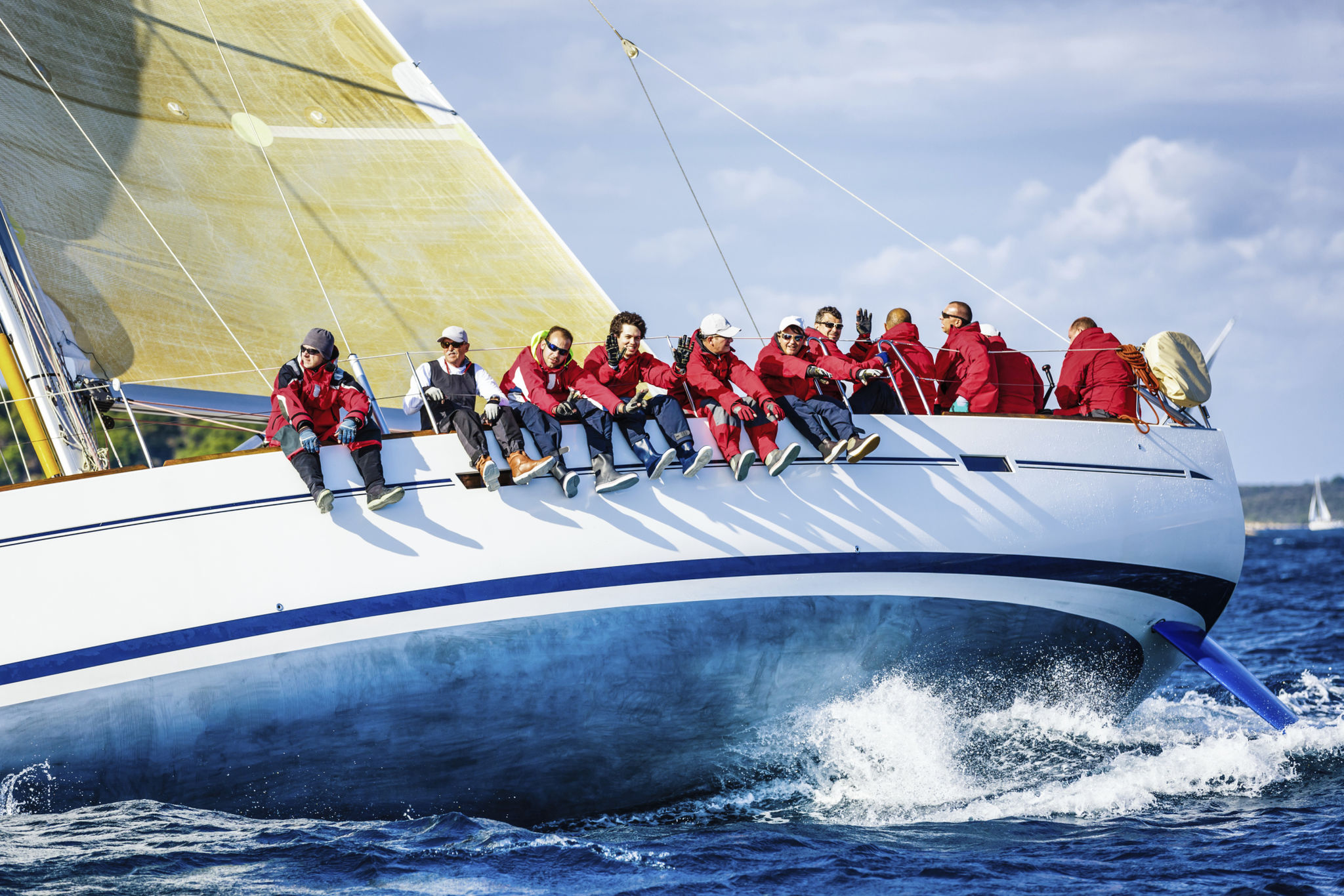 Sailing crew on sailboat during regatta Sailing crew on sailboat during regatta