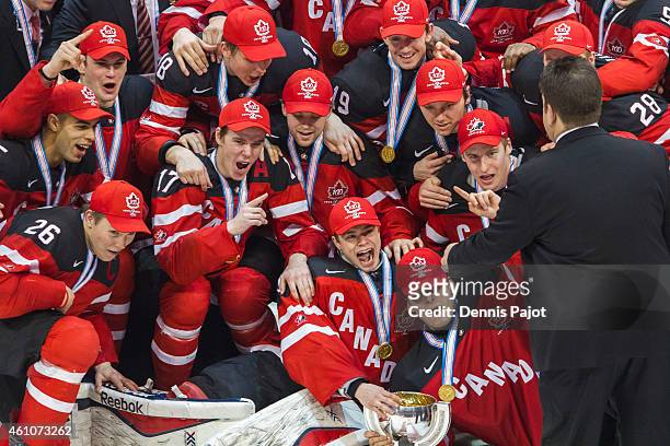 Team Canada celebrates the 5-4 win over Russia during the Gold medal game of the 2015 IIHF World Junior Championship on January 05, 2015 at the Air...