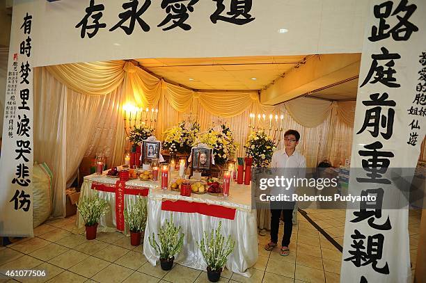 The remains of The Meiji Tejakusuma and her daughter Jie Stevie Gunawan, victims of the AirAsia flight QZ8501 disaster, are laid out at Adi Yasa...