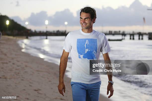 Roger Federer enjoys a relaxing walk along the beach on Tangalooma Island Resort on January 6, 2015 in Brisbane, Queensland Australia.The tennis...